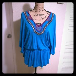 NWOT..Blue blouse with beads detail.